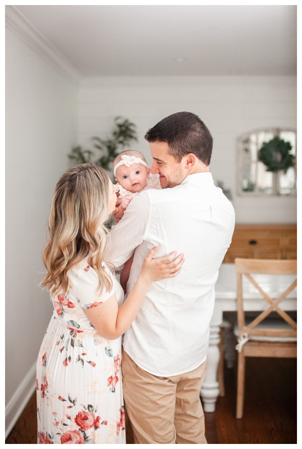 In-home newborn session with happy family