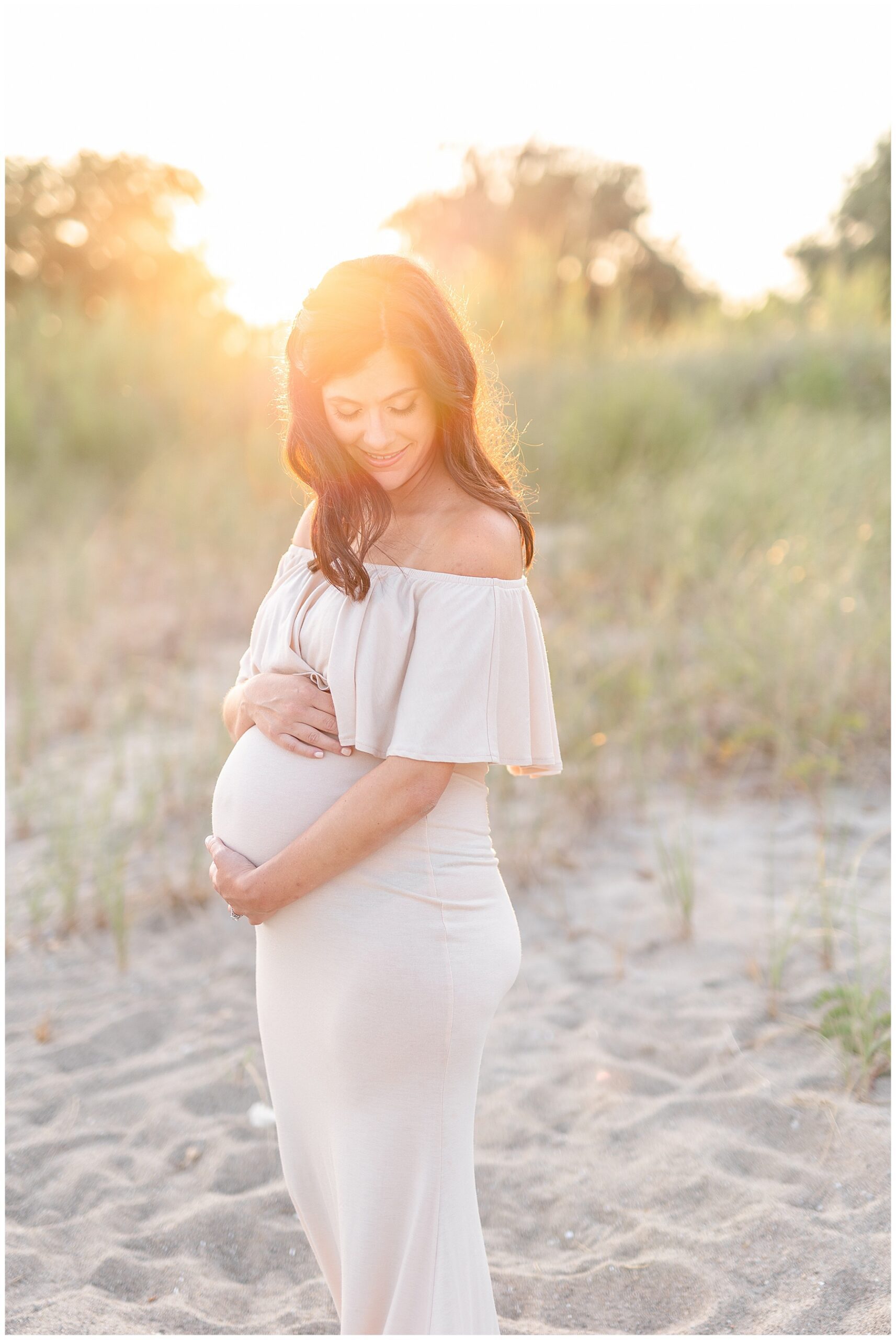 Gorgeous maternity session the beach during golden hour. Fairfield County CT hair and makeup artist for professional maternity portraits on the shore.