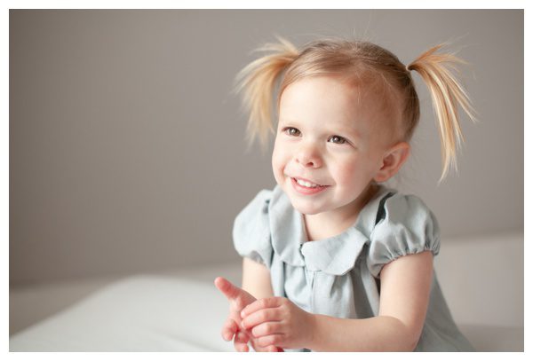 Little girl in pigtails for photos