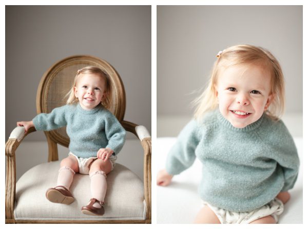 Two year old girl smiling and looking at the camera