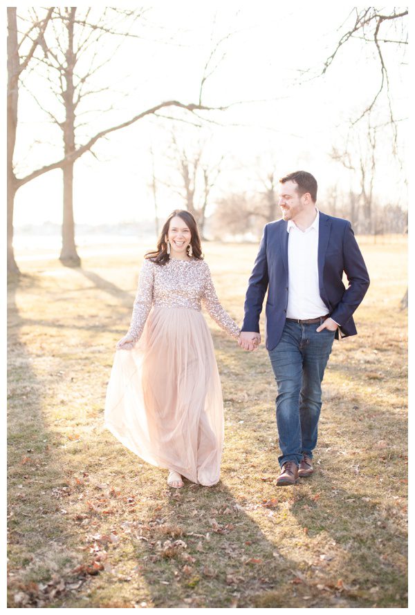 Walking and smiling during maternity portrait session