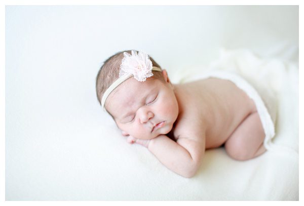 Peaceful sleeping baby on belly