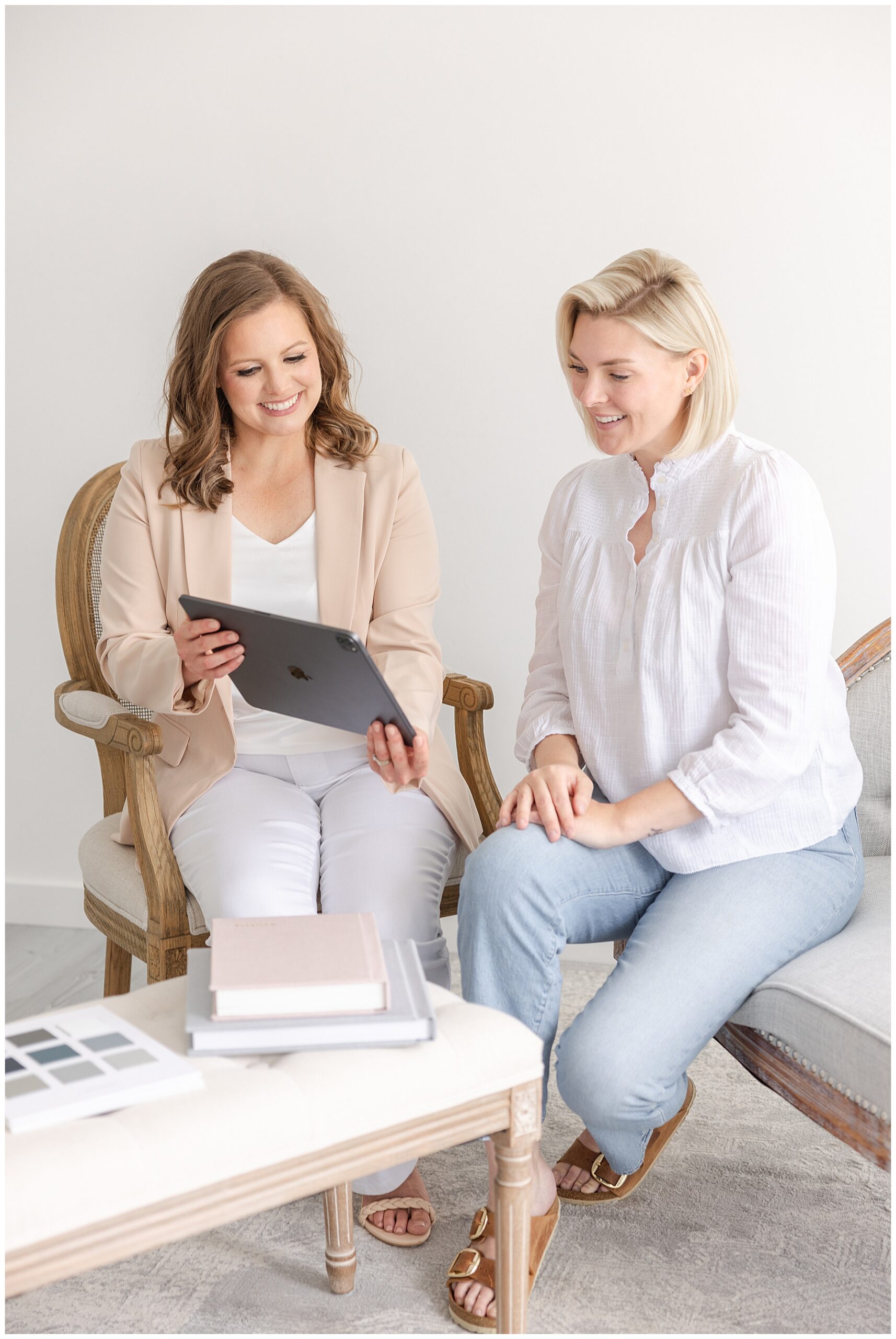 CT Photographer guides client through selecting images from her gallery in Fairfield County studio