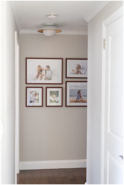 CT photographer installs custom frames in Greater Hartford home. The frames include pictures from maternity, newbor, 6 month milestone and baby's first birthday sessions.